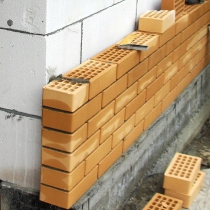 Дом из блоков, обложенный облицовочным кирпичом