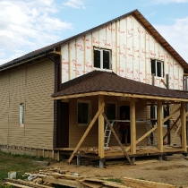 Отделка брусового дома сайдингом